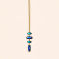 Collier LAYA Or bleu sur fond clair