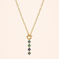 Collier long MOÉA Or bleu sur fond clair
