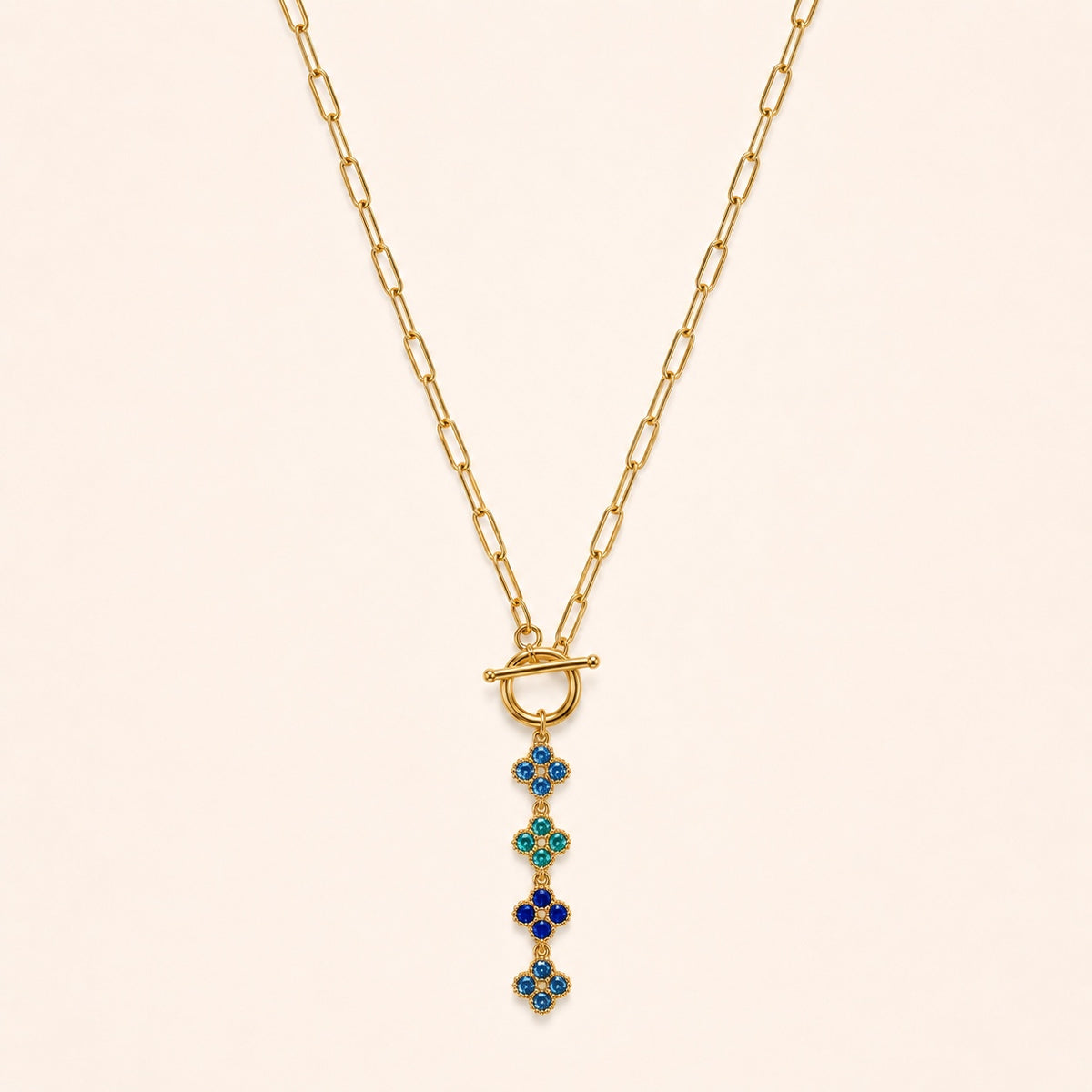 Collier long MOÉA Or bleu sur fond clair